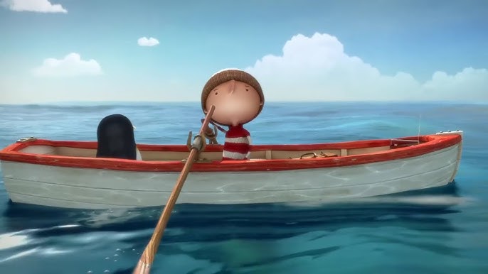 Fotograma del corto Lost and Found con el niño y el pingüino navegando juntos en el mar.